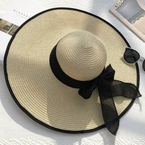 Capelina Elegante de Ala Ancha con Moño Negro – ¡Estilo y Protección Todo en Uno! 🖤